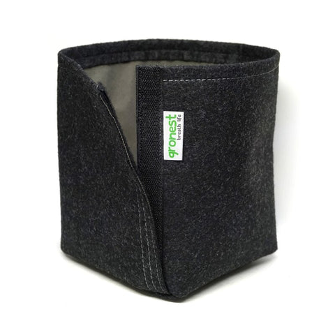 Transplanter Stofftöpfe